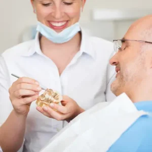 Is it Better to Get A Dental Implant or a Bridge?